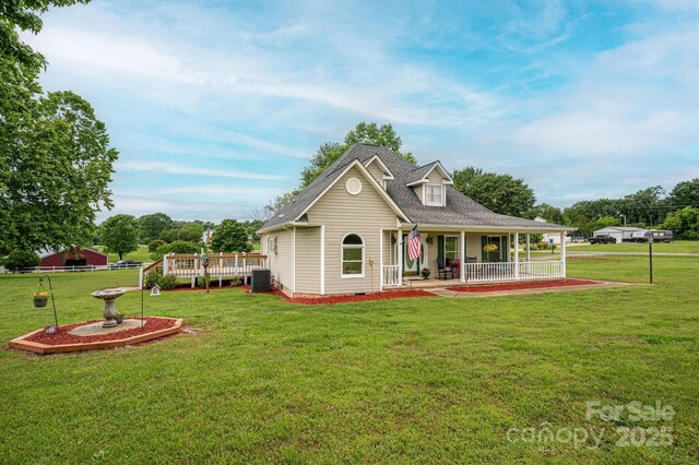 112 Ocean Dr, Shelby, NC 28152 - view of front of house featuring a porch, central air condition unit, a front yard, and roof with shingles