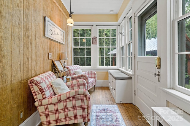147 Preservation Way, Waynesville, NC 28786 - sitting room featuring wood walls and light wood-style floors