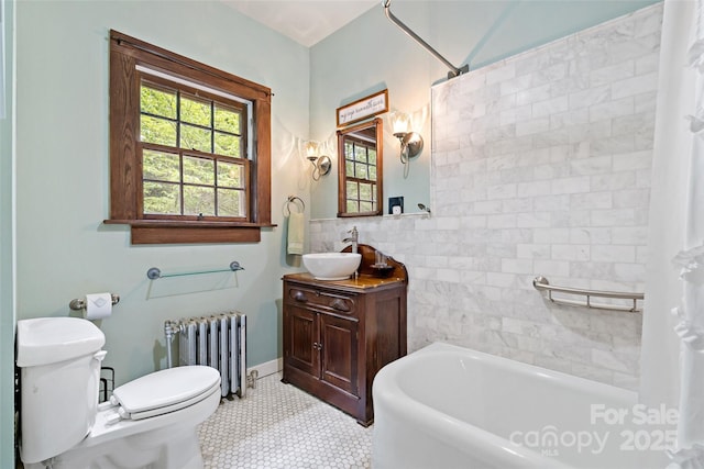 147 Preservation Way, Waynesville, NC 28786 - bathroom featuring radiator heating unit, toilet, vanity, and shower / bath combo