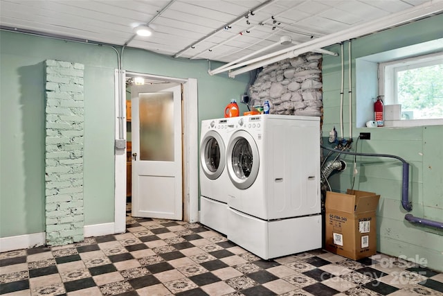147 Preservation Way, Waynesville, NC 28786 - laundry area featuring washing machine and clothes dryer and tile patterned floors