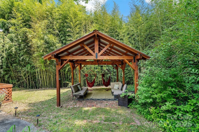 147 Preservation Way, Waynesville, NC 28786 - view of yard with a gazebo, a patio, and a forest view