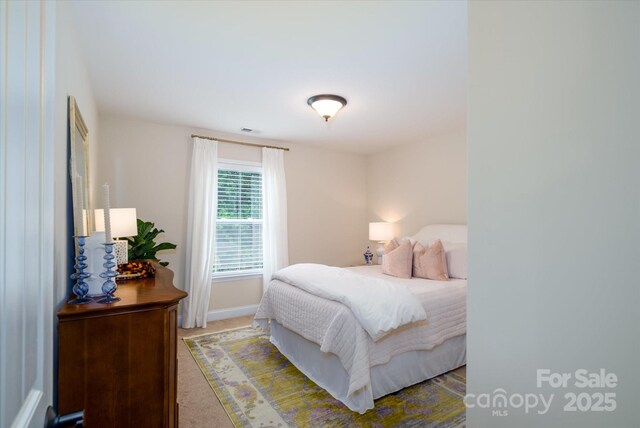 4323 Bright Rd, Charlotte, NC 28214 - bedroom with carpet floors and baseboards