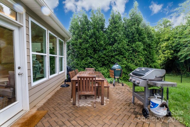 4323 Bright Rd, Charlotte, NC 28214 - view of patio / terrace featuring outdoor dining area and grilling area
