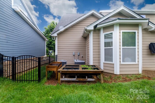 4323 Bright Rd, Charlotte, NC 28214 - rear view of house featuring a gate and central AC