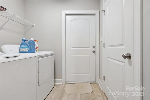 620 River Birch Dr, Salisbury, NC 28146 - washroom featuring separate washer and dryer, light wood-style flooring, and baseboards