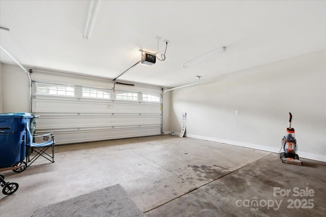 620 River Birch Dr, Salisbury, NC 28146 - garage featuring a garage door opener and baseboards