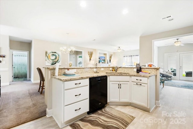 620 River Birch Dr, Salisbury, NC 28146 - kitchen featuring black dishwasher, a sink, a ceiling fan, light stone countertops, and white cabinetry