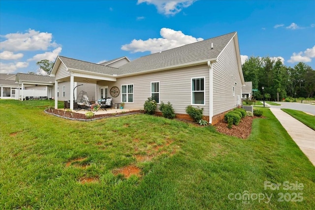 620 River Birch Dr, Salisbury, NC 28146 - rear view of house featuring a lawn, a patio area, central air condition unit, and roof with shingles