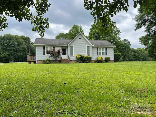 4317 Waxhaw Indian Trail Rd, Indian Trail, NC 28079 - single story home featuring crawl space, a front lawn, and a wooden deck