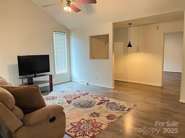4317 Waxhaw Indian Trail Rd, Indian Trail, NC 28079 - living room featuring ceiling fan, baseboards, wood finished floors, and vaulted ceiling