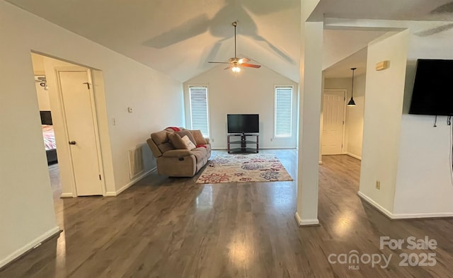 4317 Waxhaw Indian Trail Rd, Indian Trail, NC 28079 - living room with ceiling fan, dark wood-style flooring, vaulted ceiling, and baseboards