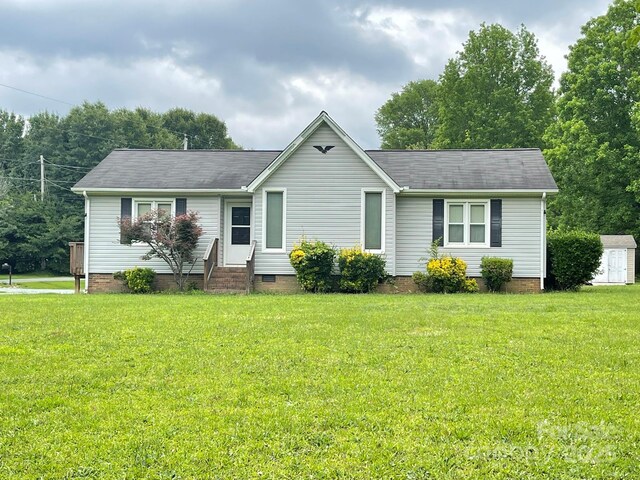 4317 Waxhaw Indian Trail Rd, Indian Trail, NC 28079 - ranch-style house featuring entry steps, crawl space, a front yard, and a shingled roof