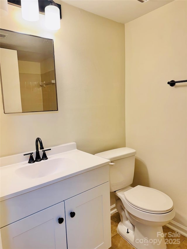 9541 Shannon Green Dr Unit C, Charlotte, NC 28213 - bathroom featuring toilet, vanity, baseboards, and tile patterned floors