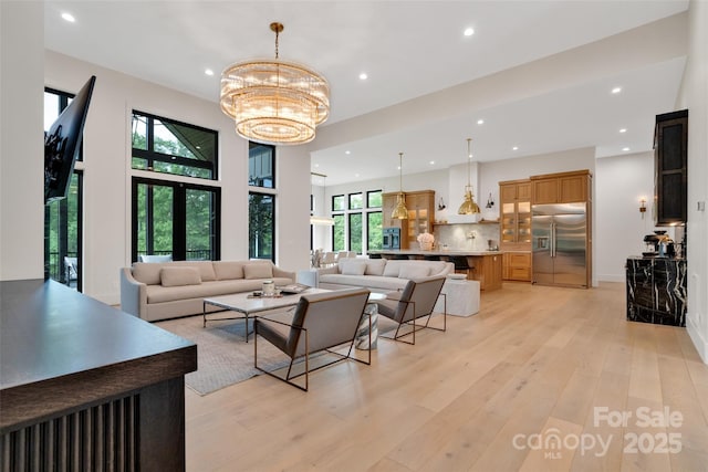 38 Thistle Ln, Fletcher, NC 28732 - living room with recessed lighting, light wood-type flooring, and a chandelier