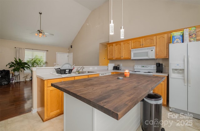 159 Pitts School Rd NW, Concord, NC 28027 - kitchen with white appliances, a peninsula, high vaulted ceiling, a ceiling fan, and wood counters