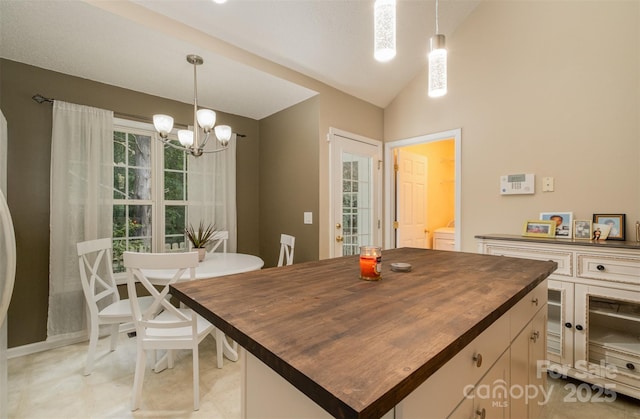 159 Pitts School Rd NW, Concord, NC 28027 - dining space featuring a chandelier and lofted ceiling