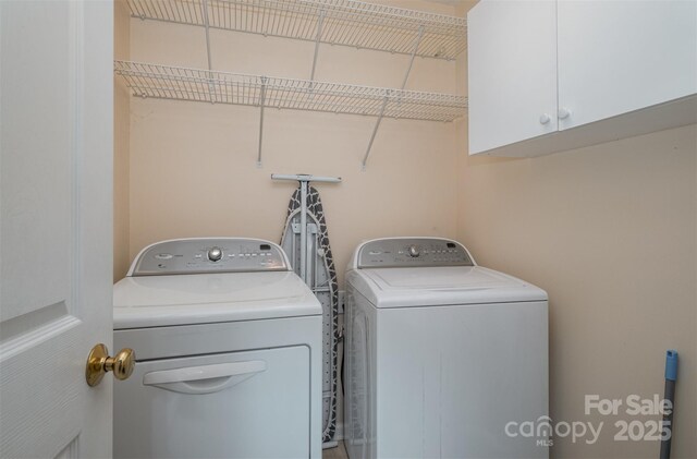 159 Pitts School Rd NW, Concord, NC 28027 - laundry area featuring washer and clothes dryer and cabinet space