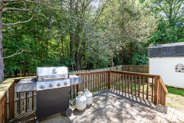 159 Pitts School Rd NW, Concord, NC 28027 - wooden terrace featuring a fenced backyard, area for grilling, and view of wooded area