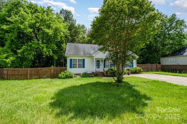 159 Pitts School Rd NW, Concord, NC 28027 - view of front facade with driveway and roof with shingles