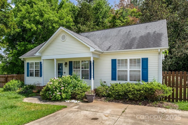 159 Pitts School Rd NW, Concord, NC 28027 - view of front of home with a shingled roof and covered porch