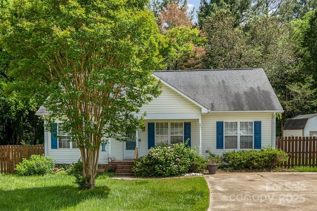 159 Pitts School Rd NW, Concord, NC 28027 - view of front of house with roof with shingles and covered porch