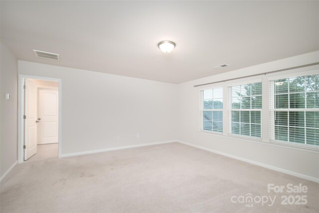 150 W Morehouse Ave, Mooresville, NC 28117 - unfurnished room with light colored carpet and baseboards