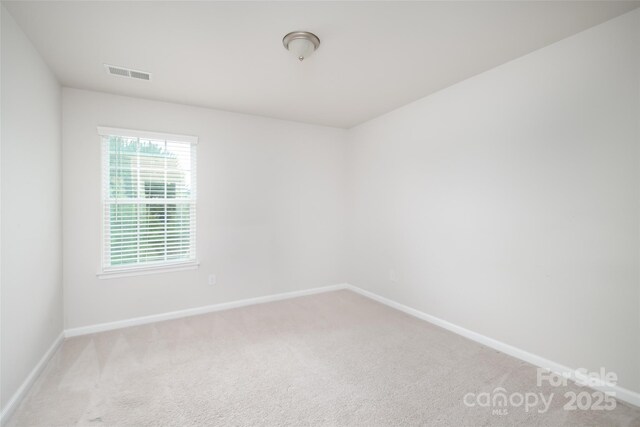 150 W Morehouse Ave, Mooresville, NC 28117 - carpeted spare room with baseboards