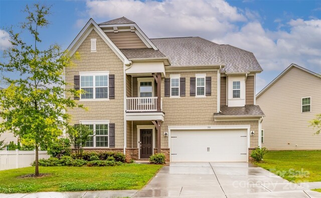 150 W Morehouse Ave, Mooresville, NC 28117 - view of front facade with a shingled roof, driveway, and a garage