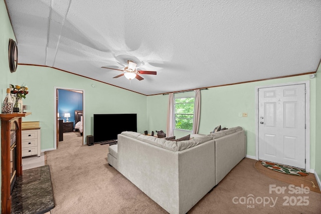 112 Cordella Rd, Candler, NC 28715 - living area featuring ceiling fan, light colored carpet, lofted ceiling, a textured ceiling, and baseboards