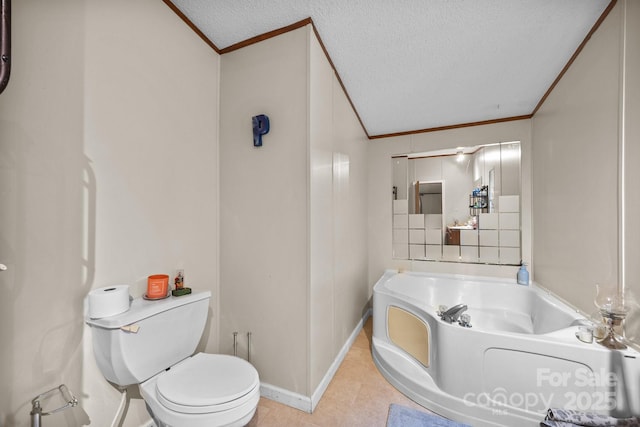 112 Cordella Rd, Candler, NC 28715 - full bathroom featuring crown molding, toilet, a bath, a textured ceiling, and baseboards