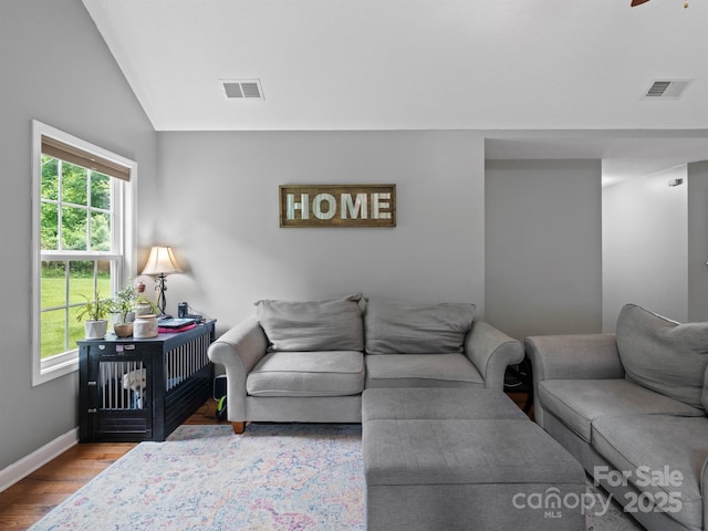 5369 Concord Rd, York, SC 29745 - living room featuring healthy amount of natural light, wood finished floors, vaulted ceiling, baseboards, and a ceiling fan