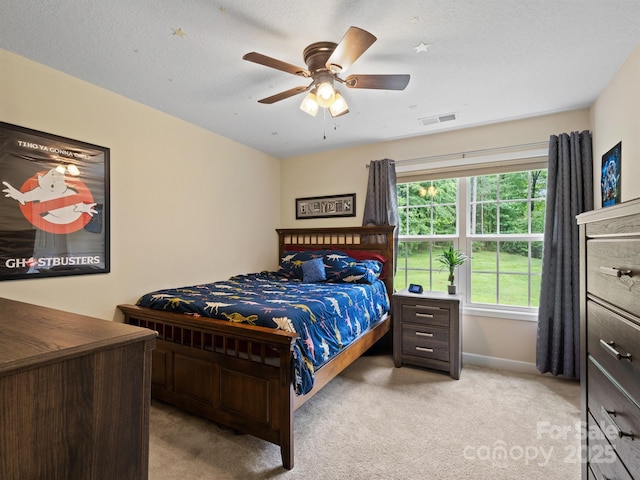 5369 Concord Rd, York, SC 29745 - bedroom with light colored carpet, baseboards, and a ceiling fan