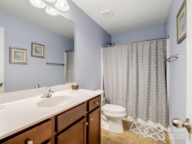 5369 Concord Rd, York, SC 29745 - full bath featuring vanity, toilet, and tile patterned flooring