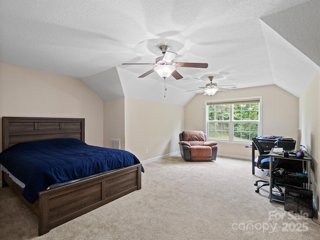 5369 Concord Rd, York, SC 29745 - carpeted bedroom with vaulted ceiling, a textured ceiling, a ceiling fan, and baseboards