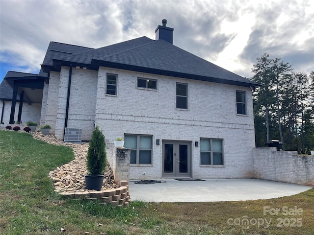 1427 Kinks Ln Unit 47, Maiden, NC 28650 - back of house with french doors, a chimney, a patio, brick siding, and a lawn