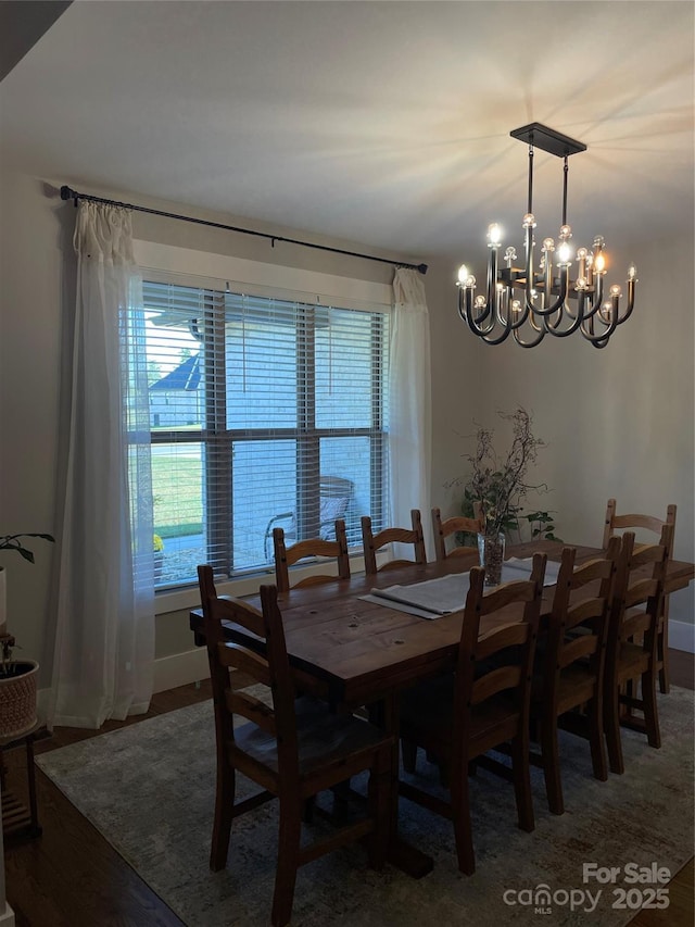 1427 Kinks Ln Unit 47, Maiden, NC 28650 - dining area featuring a chandelier, baseboards, and wood finished floors