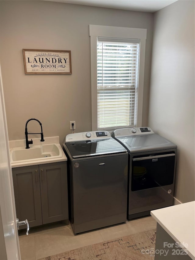 1427 Kinks Ln Unit 47, Maiden, NC 28650 - laundry room with washing machine and clothes dryer, cabinet space, and light tile patterned floors