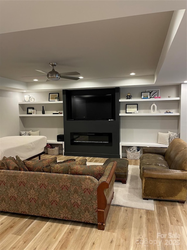 1427 Kinks Ln Unit 47, Maiden, NC 28650 - living area featuring wood finished floors, a ceiling fan, a fireplace, and recessed lighting