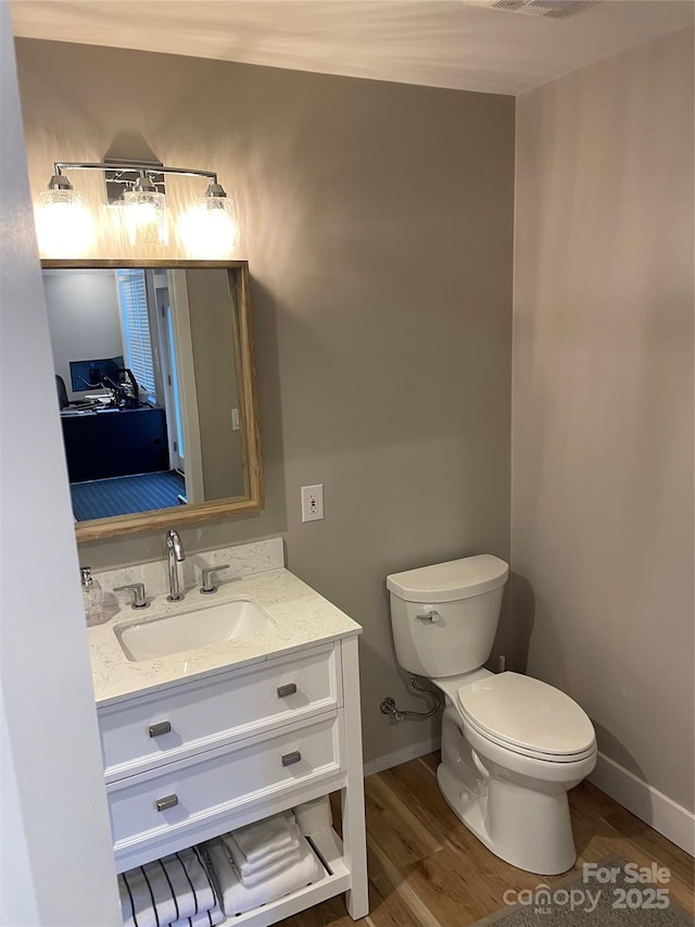 1427 Kinks Ln Unit 47, Maiden, NC 28650 - bathroom with toilet, wood finished floors, vanity, and baseboards