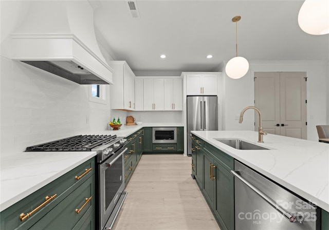 2033 Camp Greene St, Charlotte, NC 28208 - kitchen with green cabinets, premium appliances, a sink, custom exhaust hood, and white cabinets