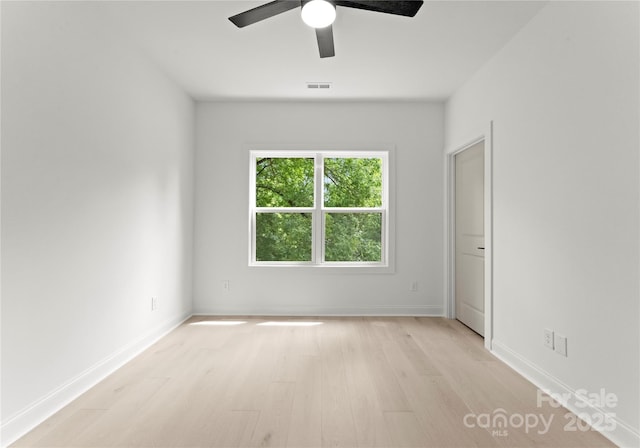 2033 Camp Greene St, Charlotte, NC 28208 - unfurnished room with light wood-style flooring, ceiling fan, and baseboards