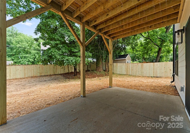 2033 Camp Greene St, Charlotte, NC 28208 - fenced backyard featuring a patio area