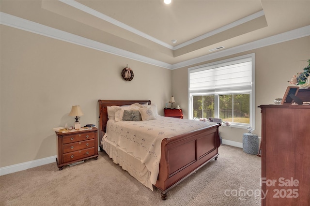 608 Latrobe Dr, Iron Station, NC 28080 - bedroom with light colored carpet, a tray ceiling, crown molding, and baseboards