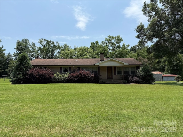6018 Unionville Rd, Monroe, NC 28110 - ranch-style house featuring a chimney and a front lawn