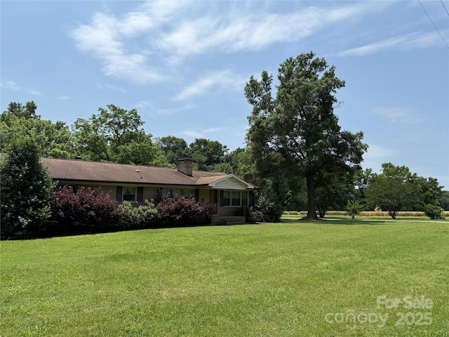 6018 Unionville Rd, Monroe, NC 28110 - view of green lawn with a sunroom