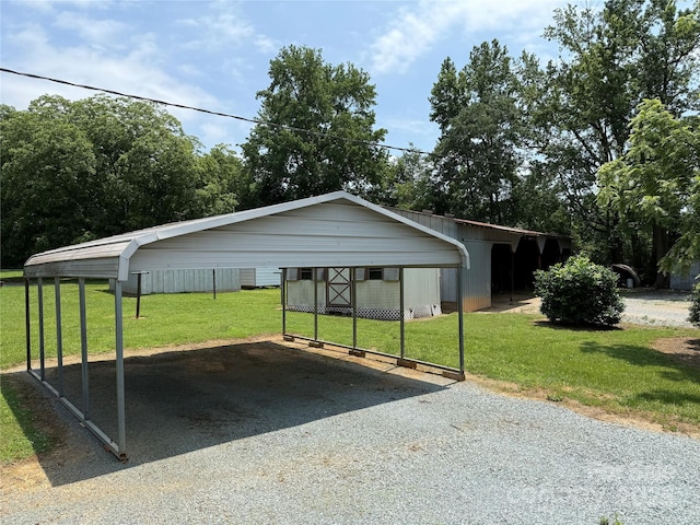 6018 Unionville Rd, Monroe, NC 28110 - view of parking featuring a carport and gravel driveway