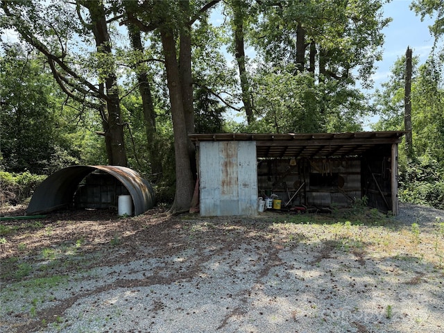 6018 Unionville Rd, Monroe, NC 28110 - view of pole building featuring a detached carport