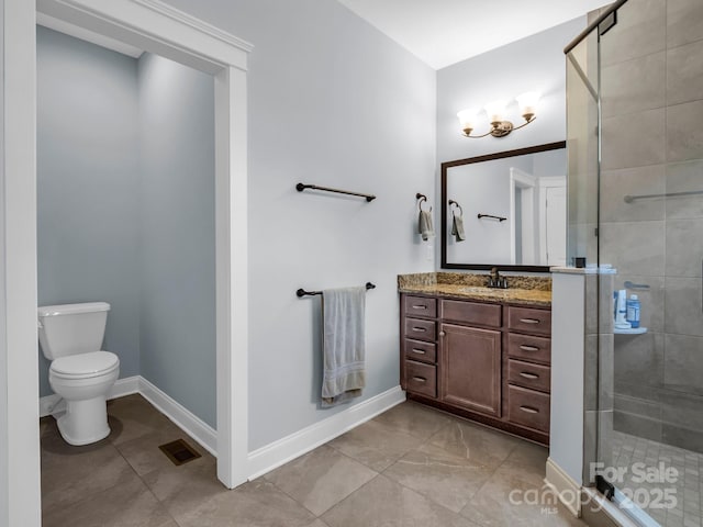 26 Balsam High Rd, Candler, NC 28715 - bathroom with vanity, a shower stall, toilet, and baseboards