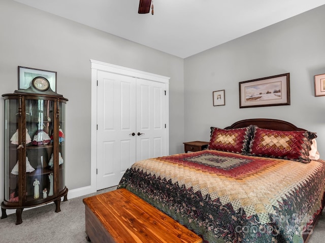 26 Balsam High Rd, Candler, NC 28715 - bedroom featuring carpet flooring, a closet, baseboards, and a ceiling fan