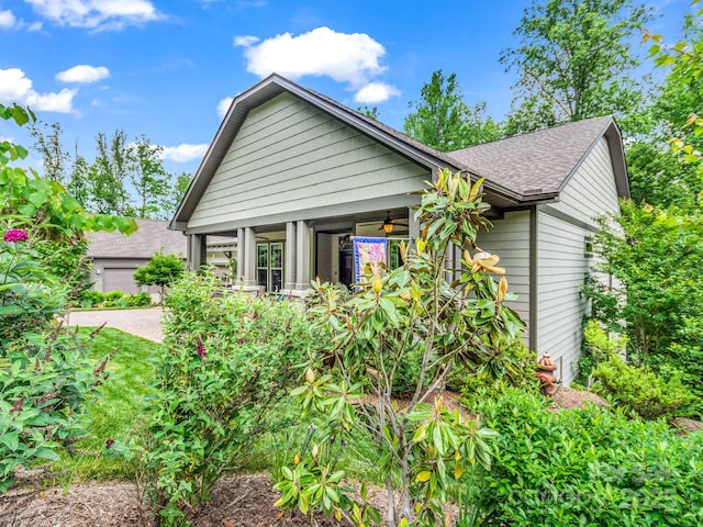 26 Balsam High Rd, Biltmore Lake, NC 28715 - view of property exterior with a ceiling fan and roof with shingles